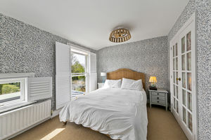 Bedroom One- click for photo gallery